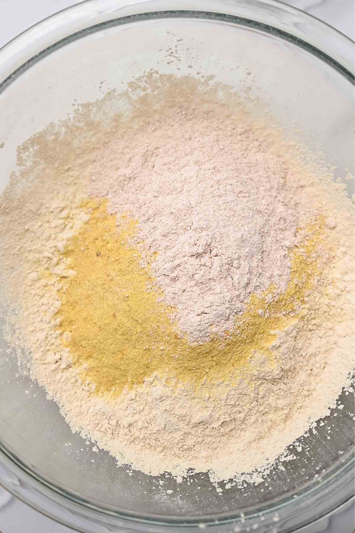 vital wheat gluten and spices in a large glass bowl.