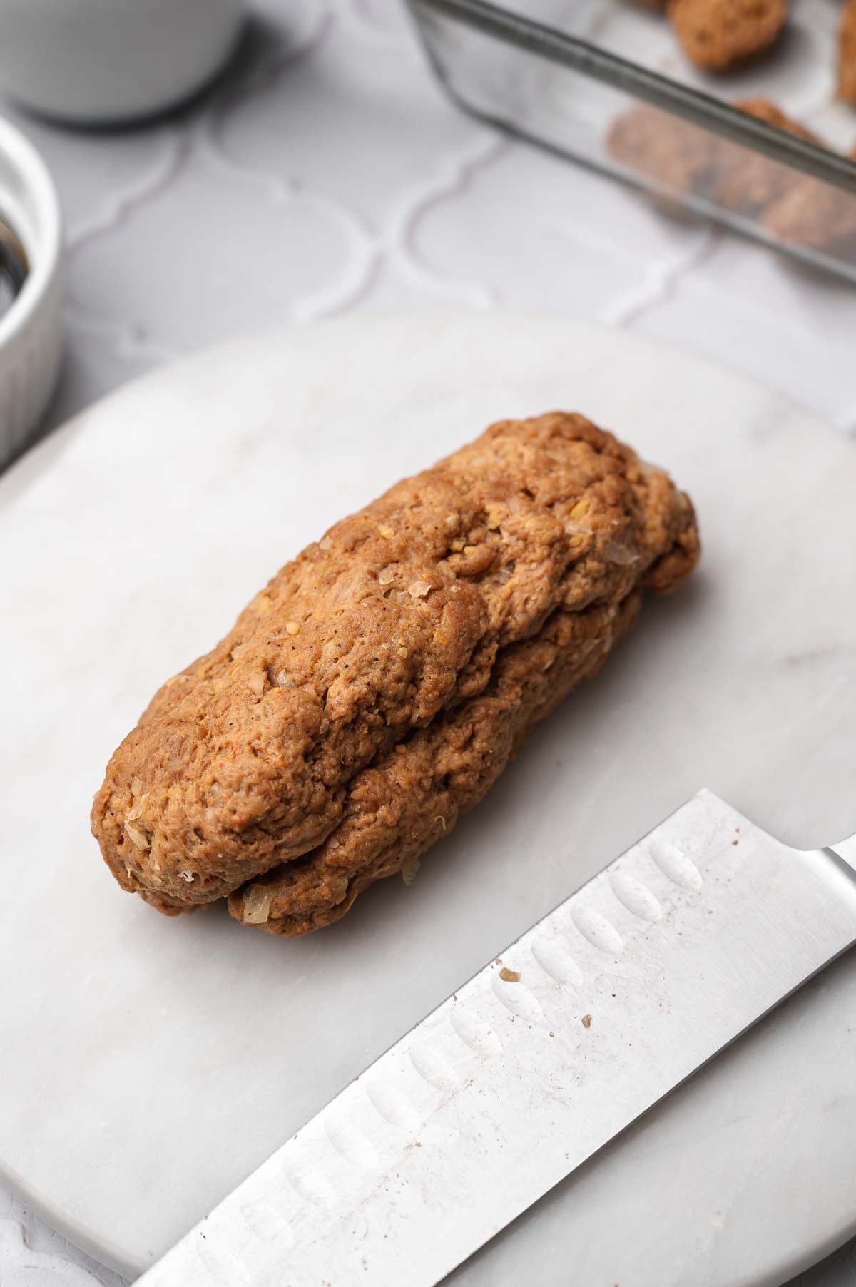 the seitan beef shaped in a rectangular loaf.