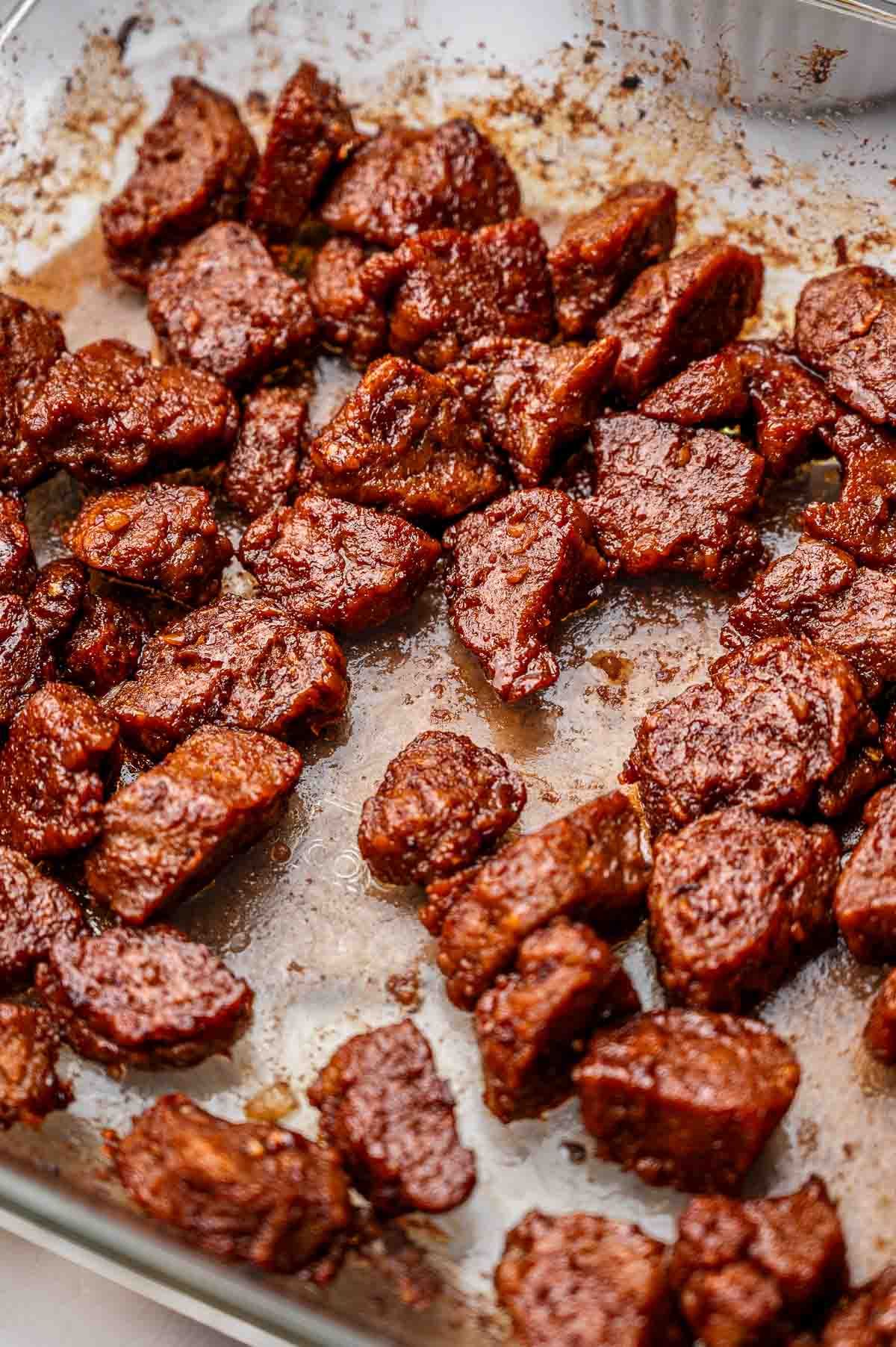 the vegan beef in a pan after baking.