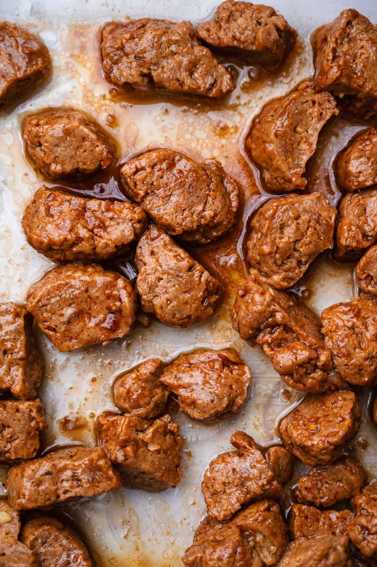 the cut seitan dough with marinade on top.