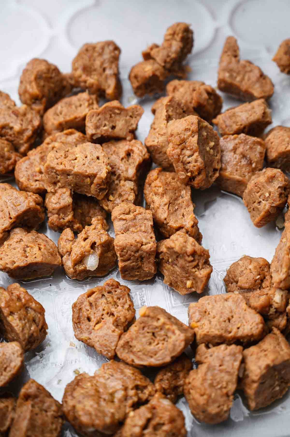 the chopped seitan beef pieces in a baking sheet.