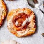 pumpkin pie cream cheese danish with icing on top.