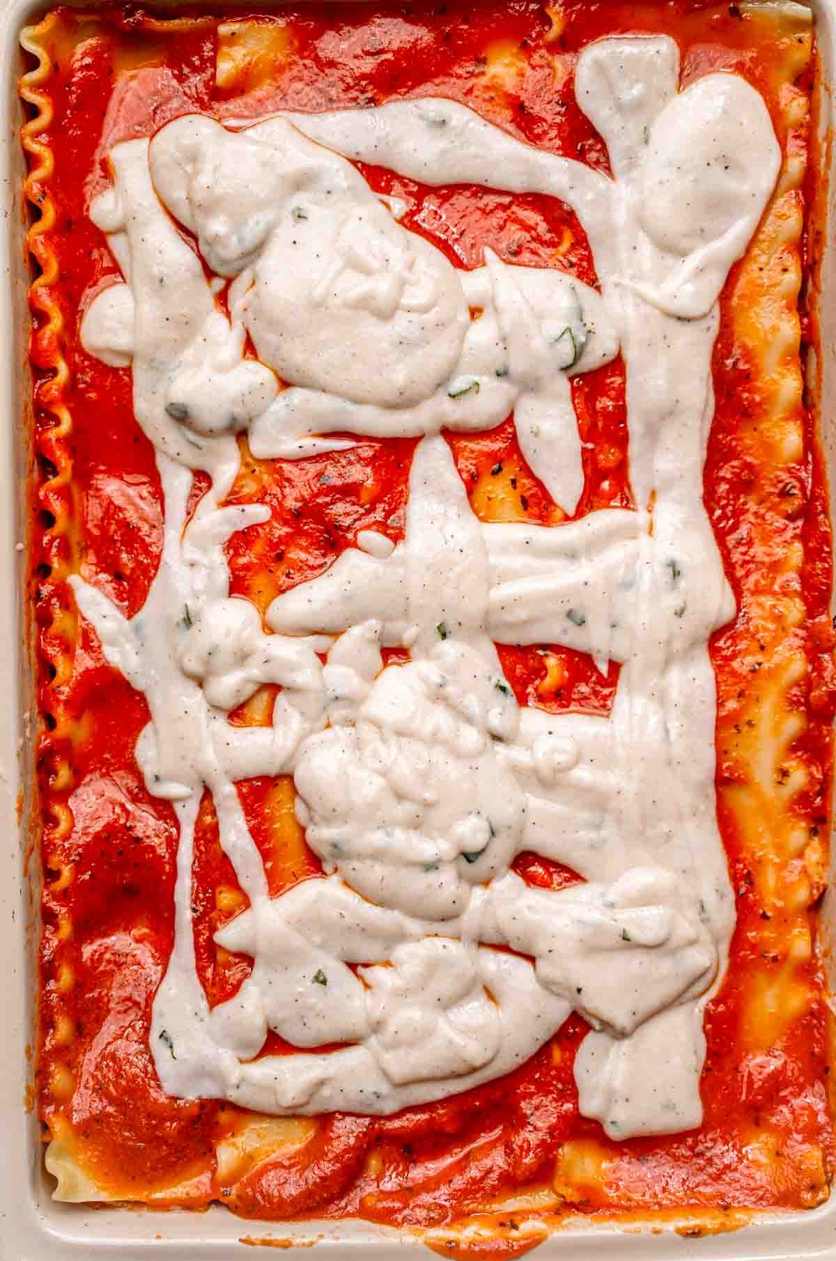Vegan béchamel sauce on top of the lasagna.
