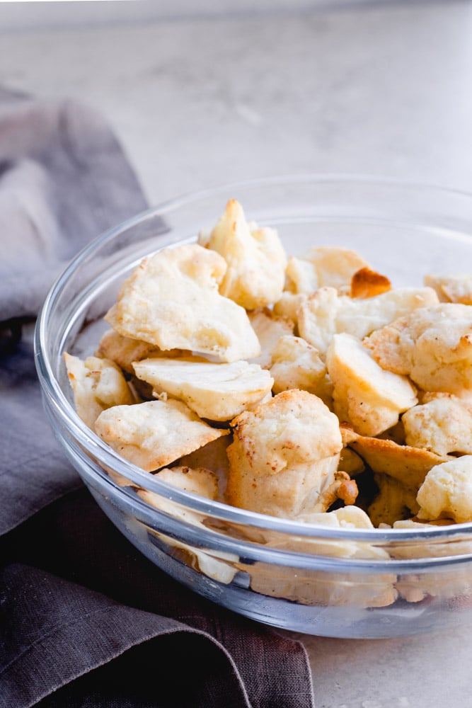 the air-fried cauliflower in a glass bowl.