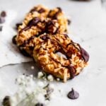 vegan caramel delite samoa cookies on a stone surface.