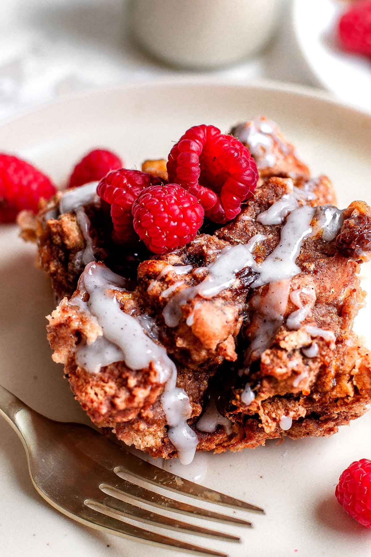 a close up of the vegan french toast casserole on a plate.