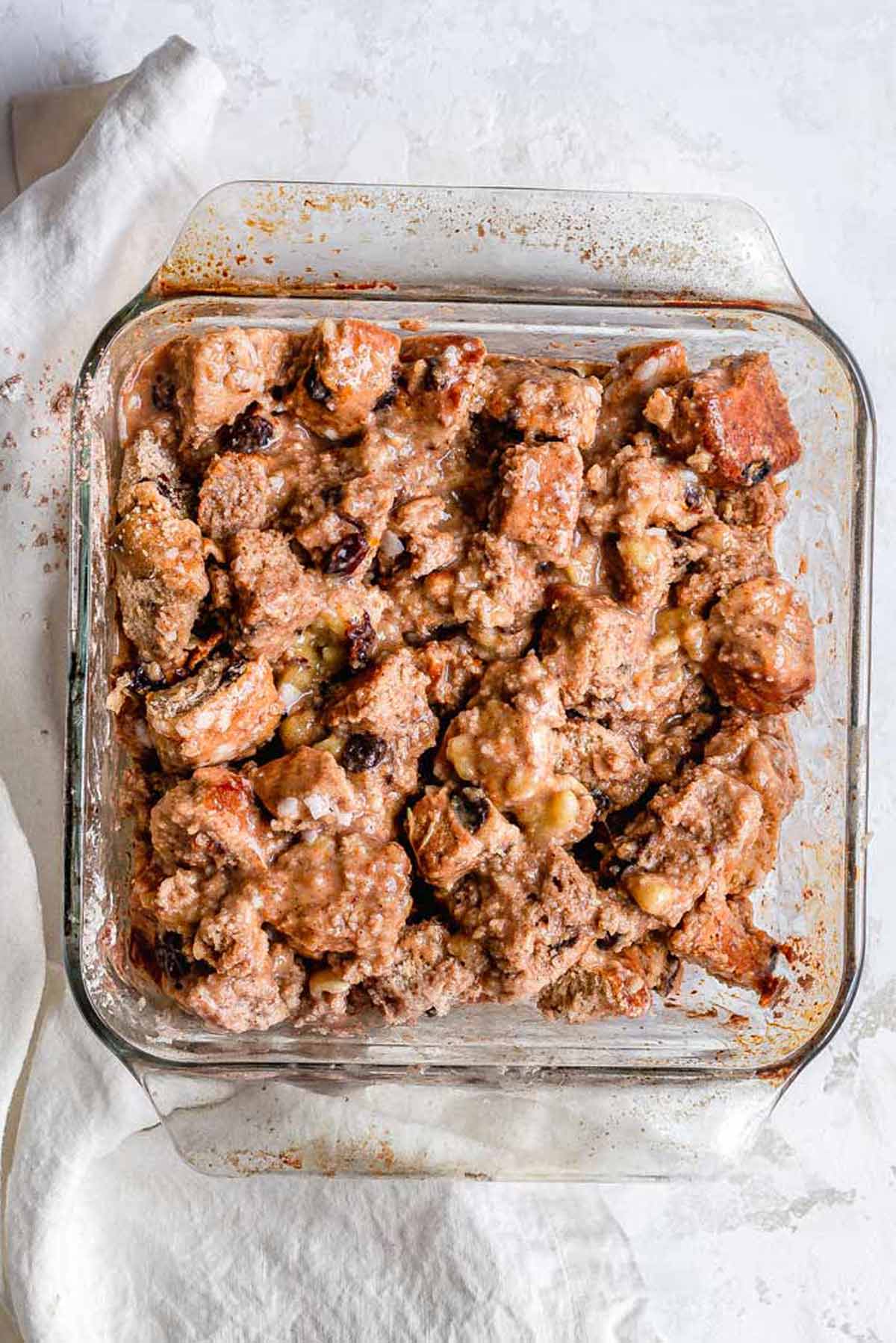 the bread cubes soaking in the eggless custard.