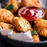vegan air fryer tofu nuggets in a basket.