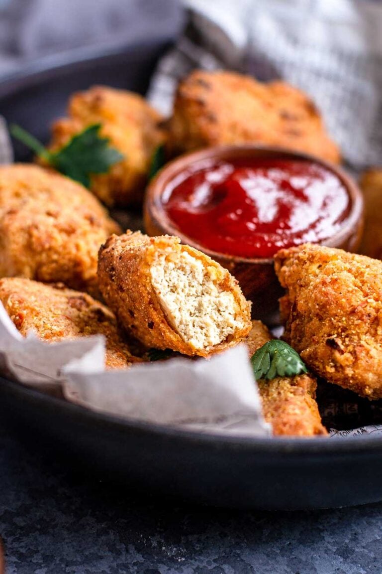 vegan air fryer tofu nuggets in a basket.