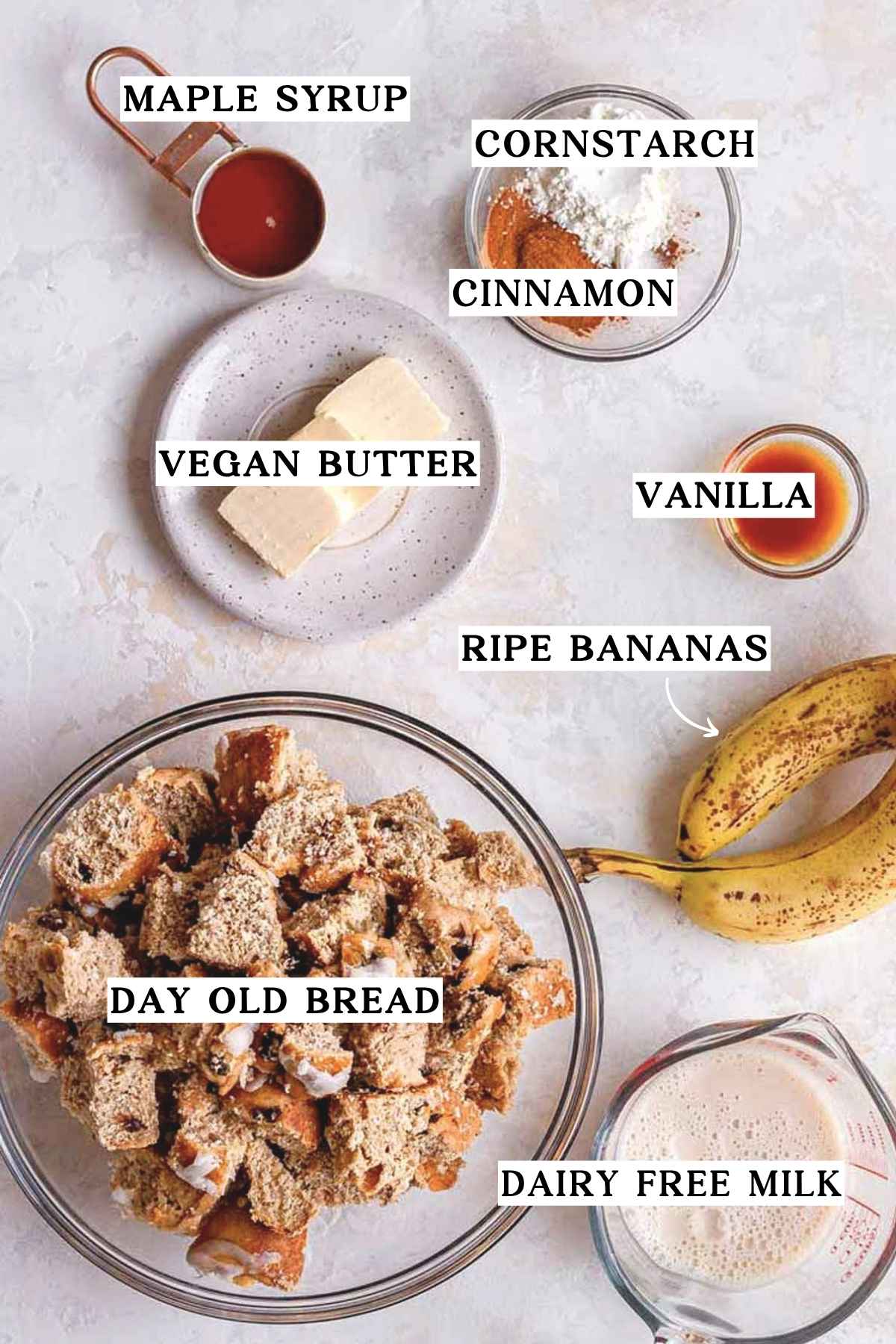 bowls of day old bread, cornstarch, vanilla and ripe bananas.