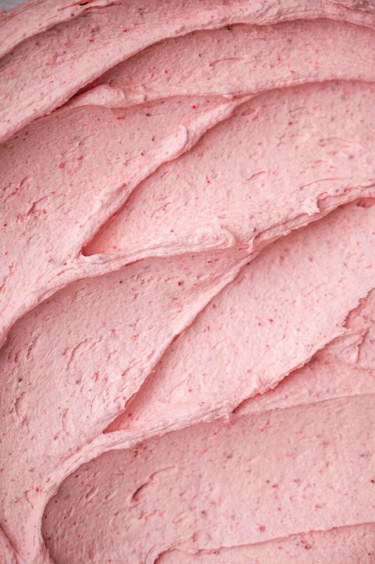 a close up of vegan strawberry buttercream frosting.