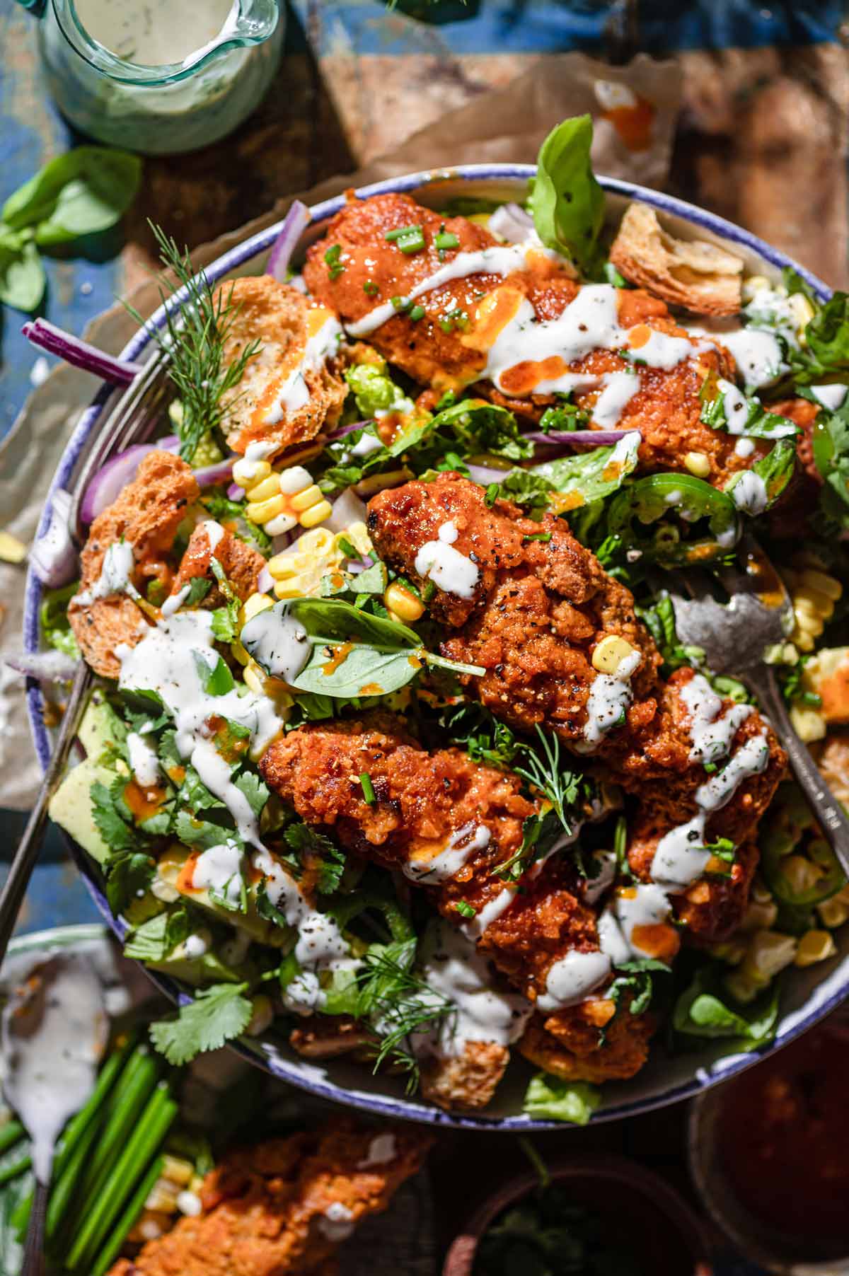 vegan buffalo chicken salad topped with homemade ranch.