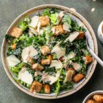vegan caesar salad with kale, croutons and homemade dressing.