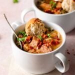 vegan zuppa toscana with crusty bread.