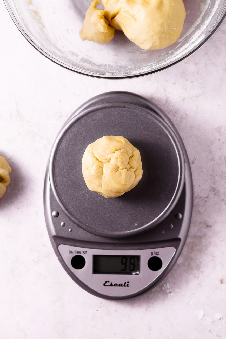 the brioche dough divided into balls.