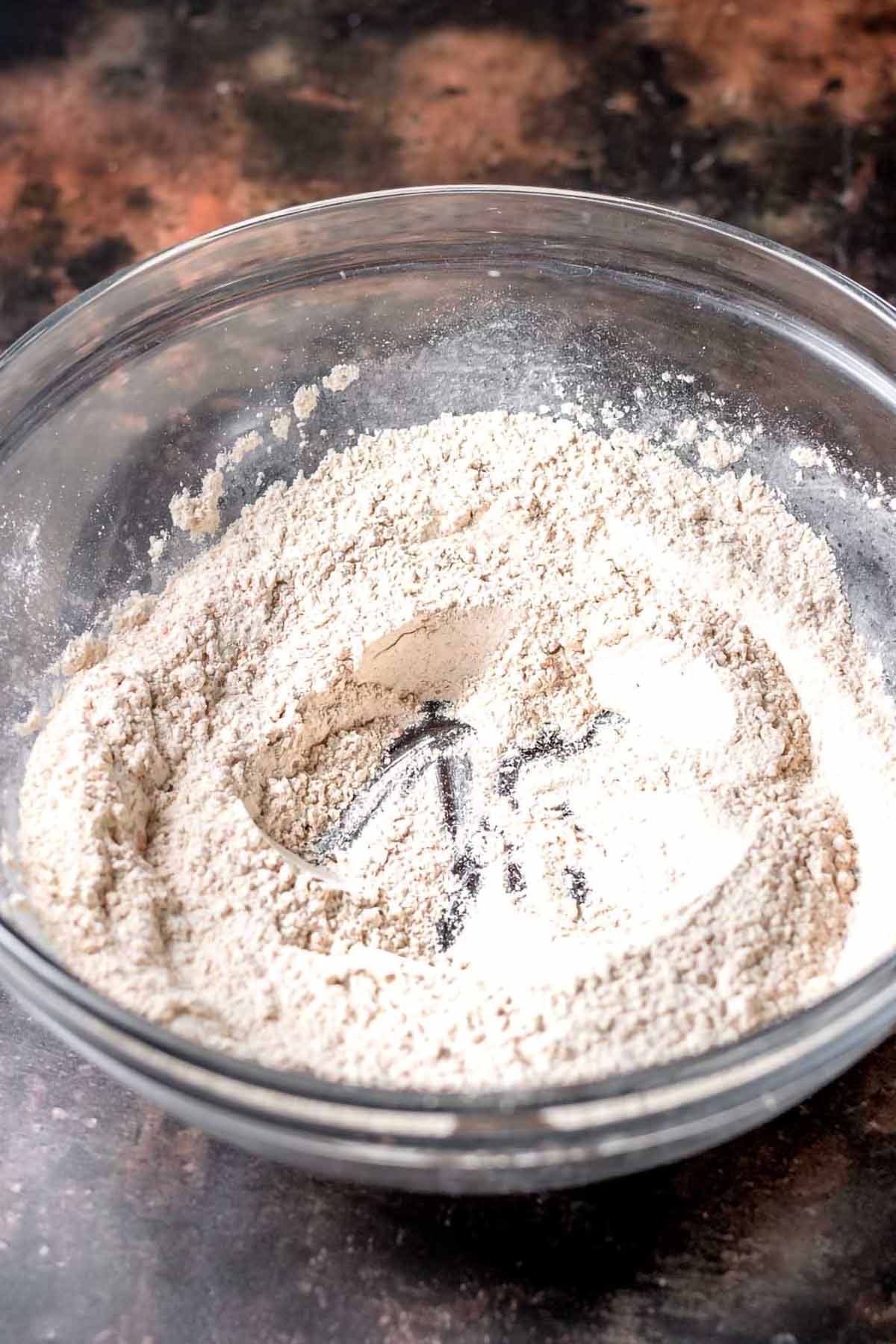 dry ingredients like vital wheat gluten and spices in a bowl.