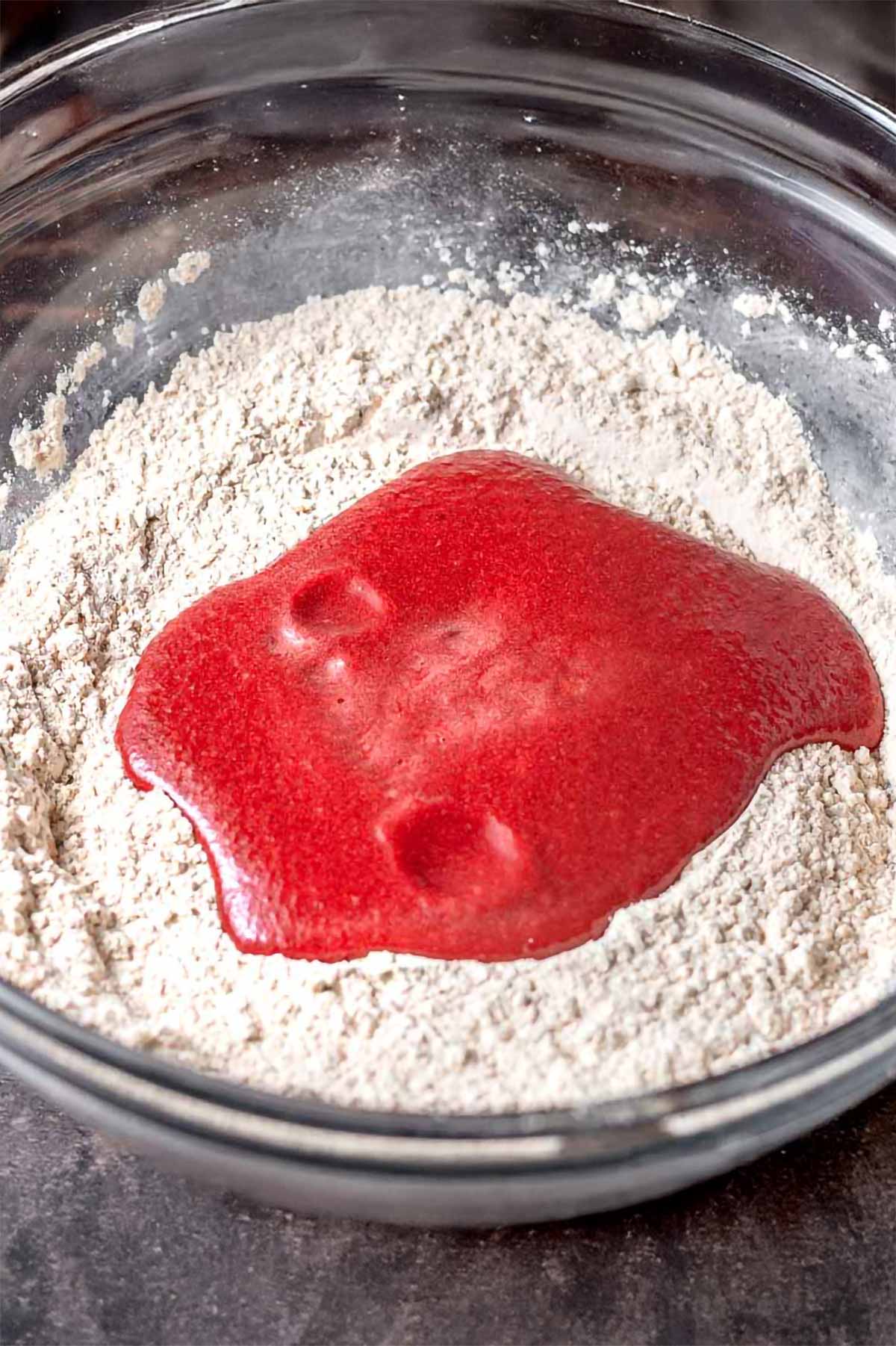wet ingredients in a bowl filled with vital wheat gluten.