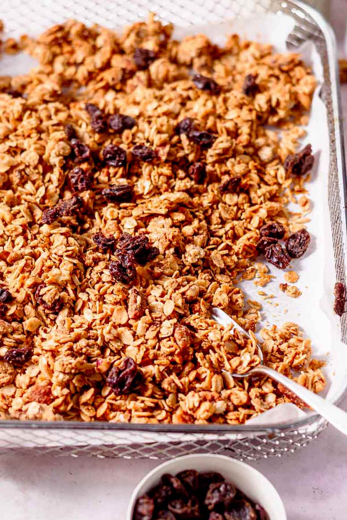 an air fryer basket filled with air-fried granola.
