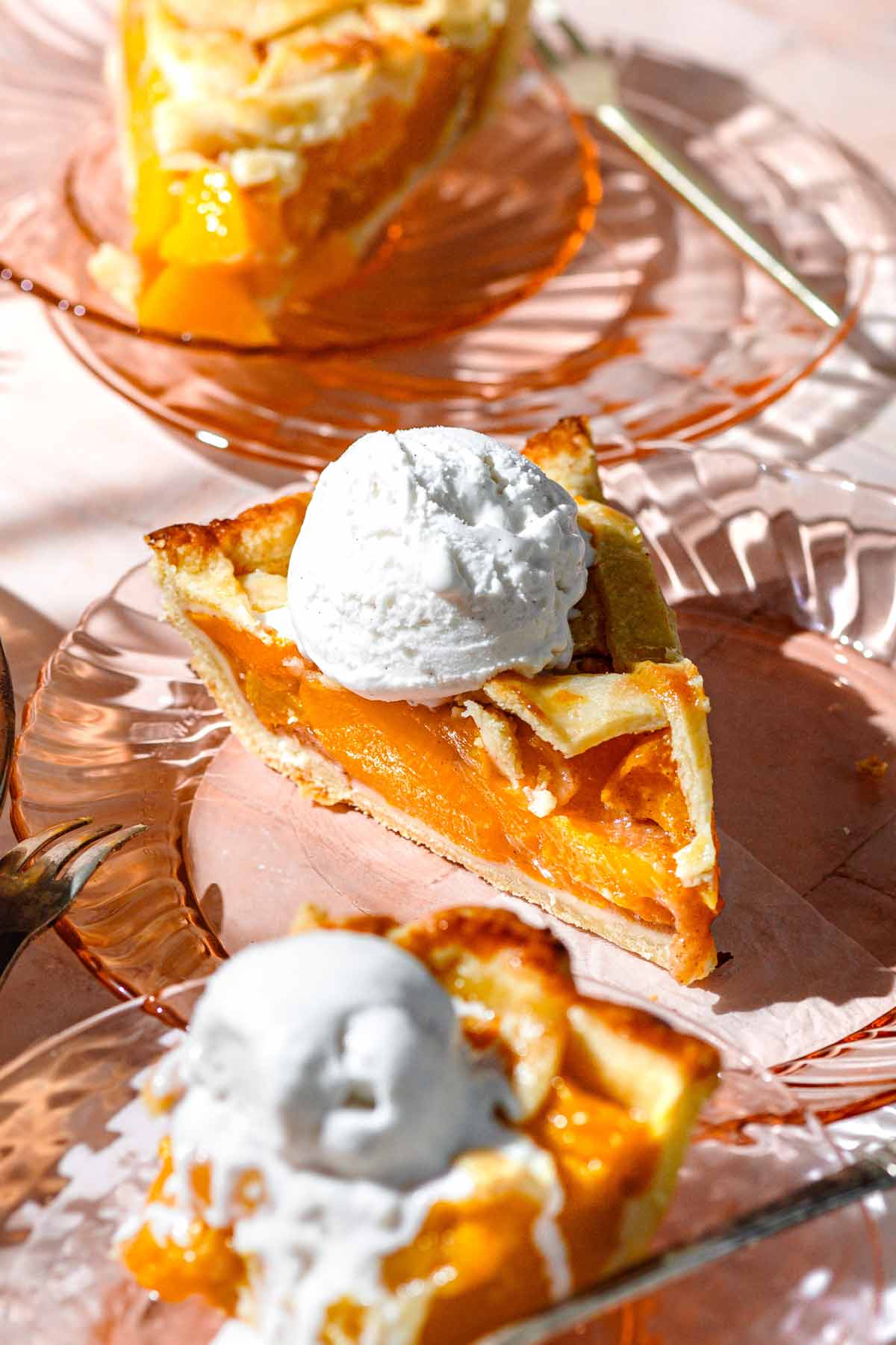 pie made with canned peaches with a scoop of dairy-free ice cream on top.