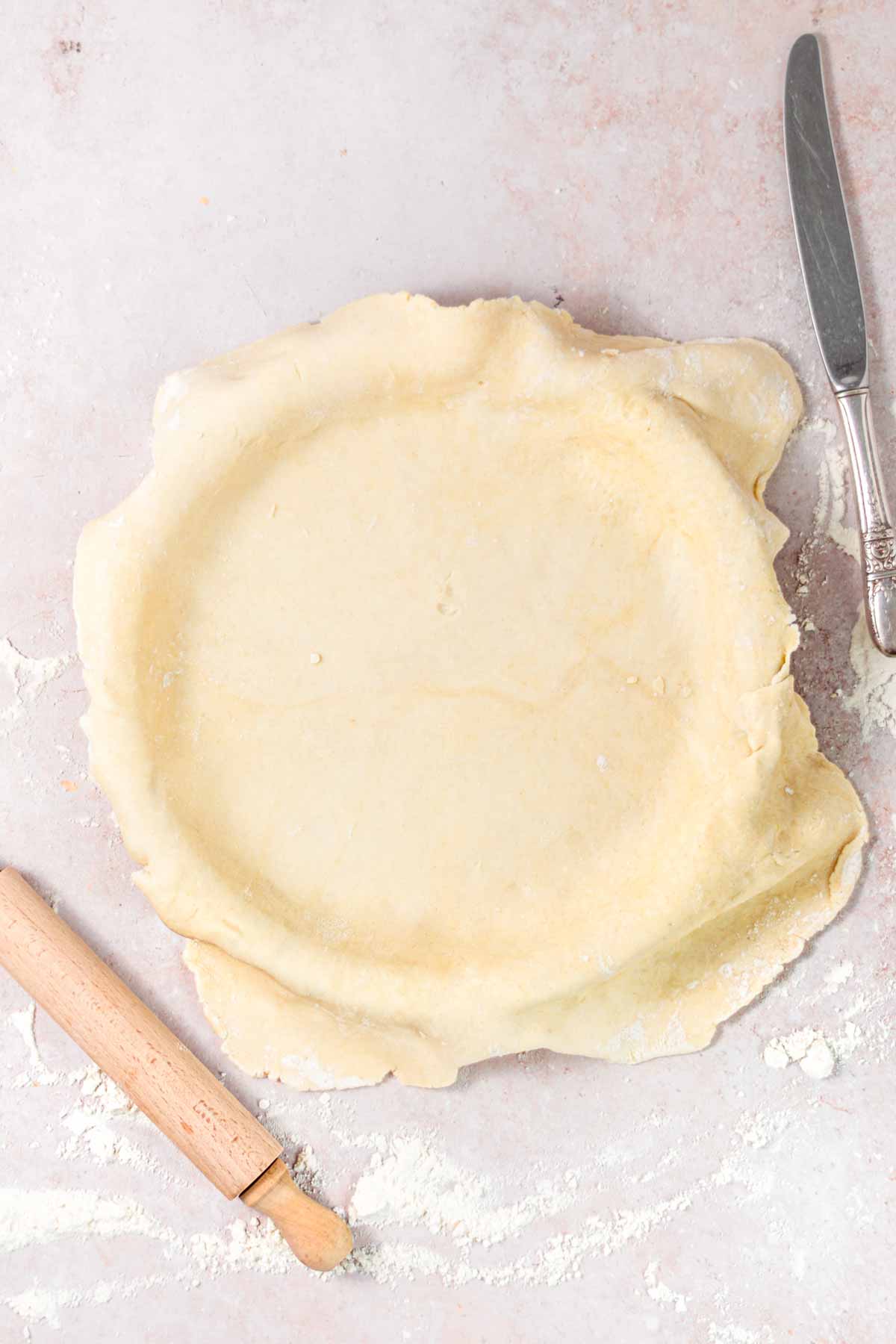 vegan pie dough in a pie pan.