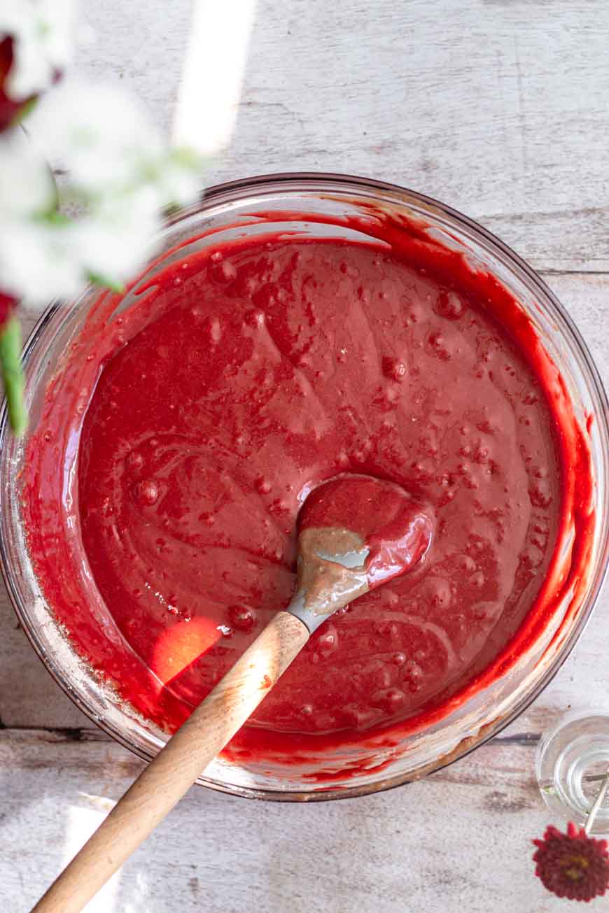 vegan red velvet cake batter with food coloring mixed in.