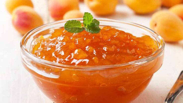 apricot jam in a glass bowl.