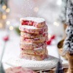 cranberry almond shortbread stacked on each other.