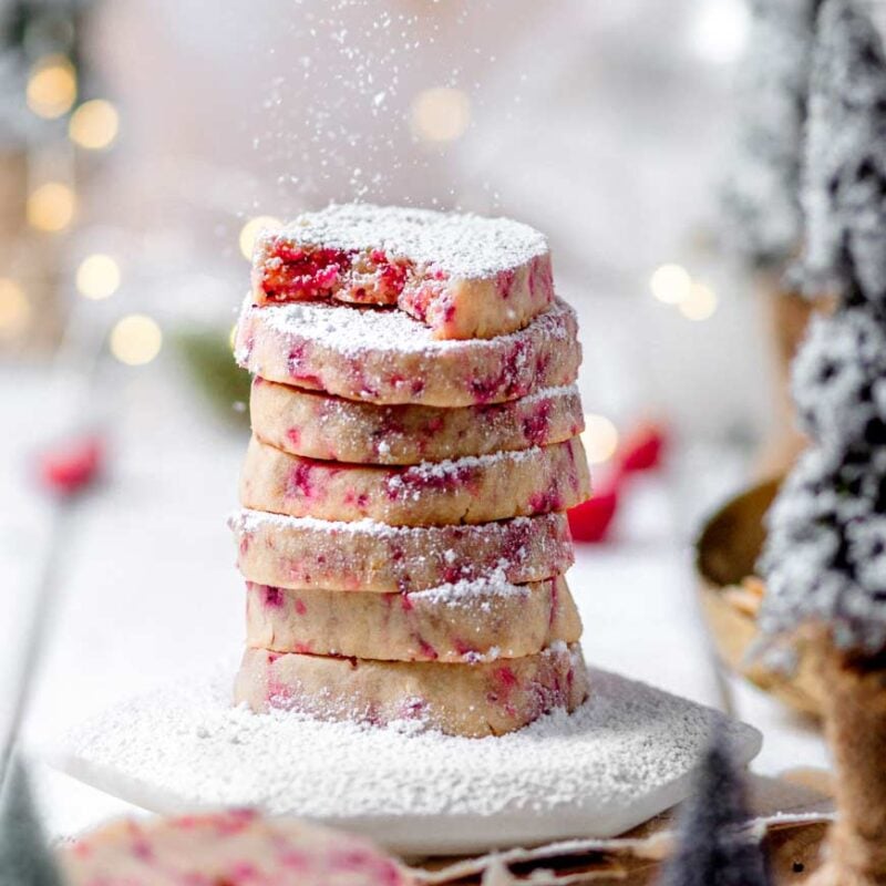 cranberry almond shortbread stacked on each other.