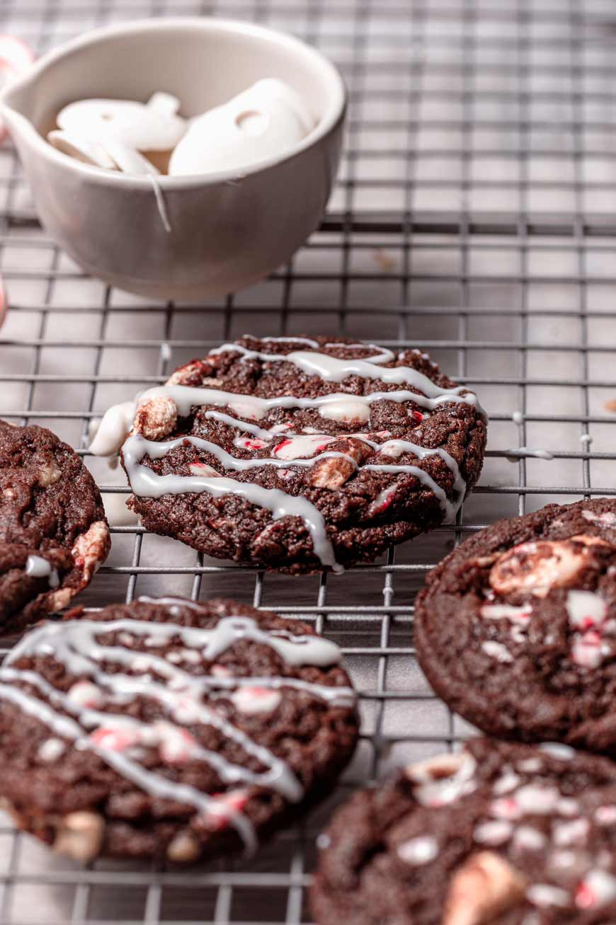 the vegan peppermint cookies with white chocolate drizzled on top.