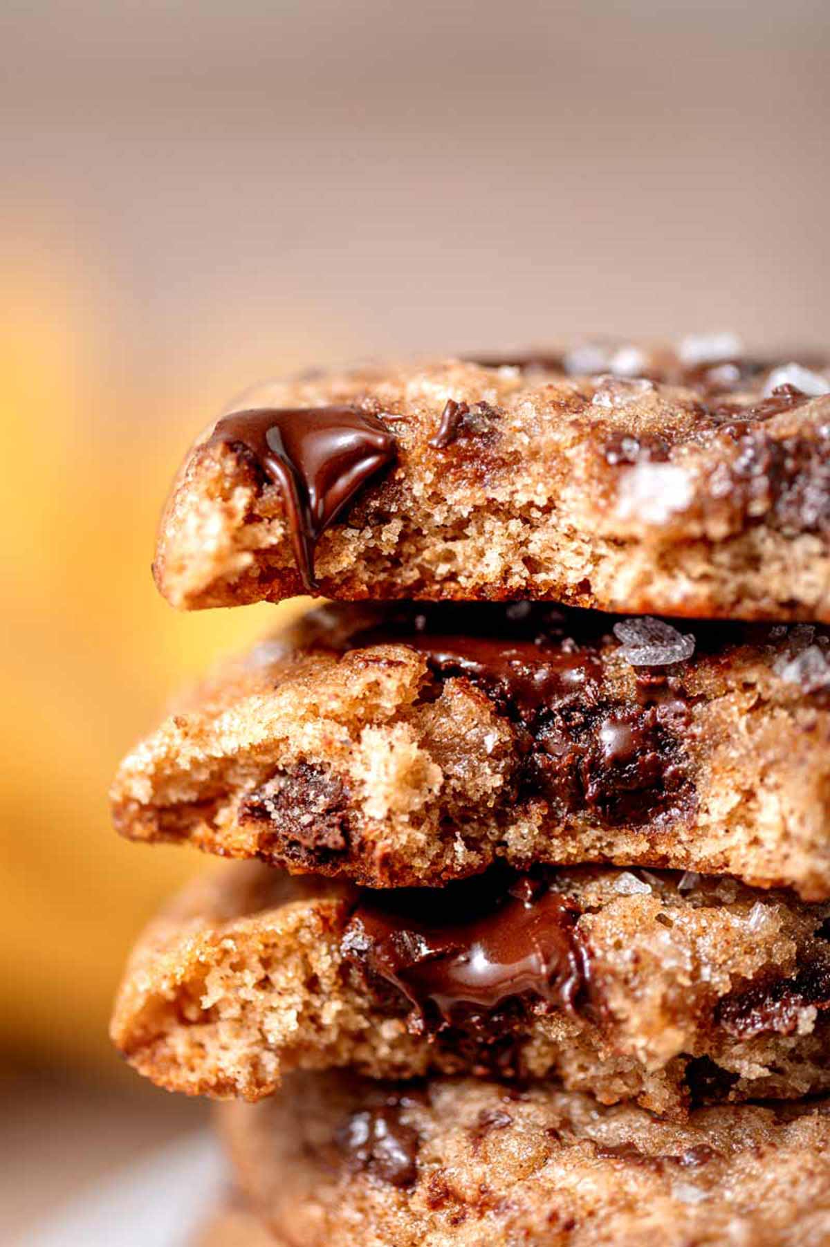 a focus shot of the texture of the vegan banana bread cookies with melted chocolate chips.