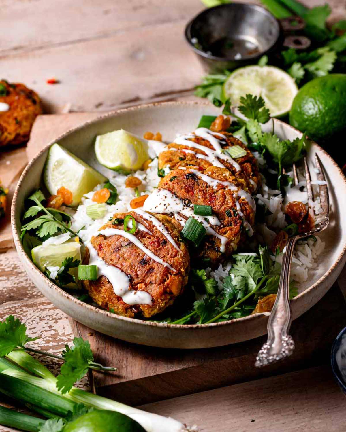 the cooked chickpea patties with lime aioli on top.