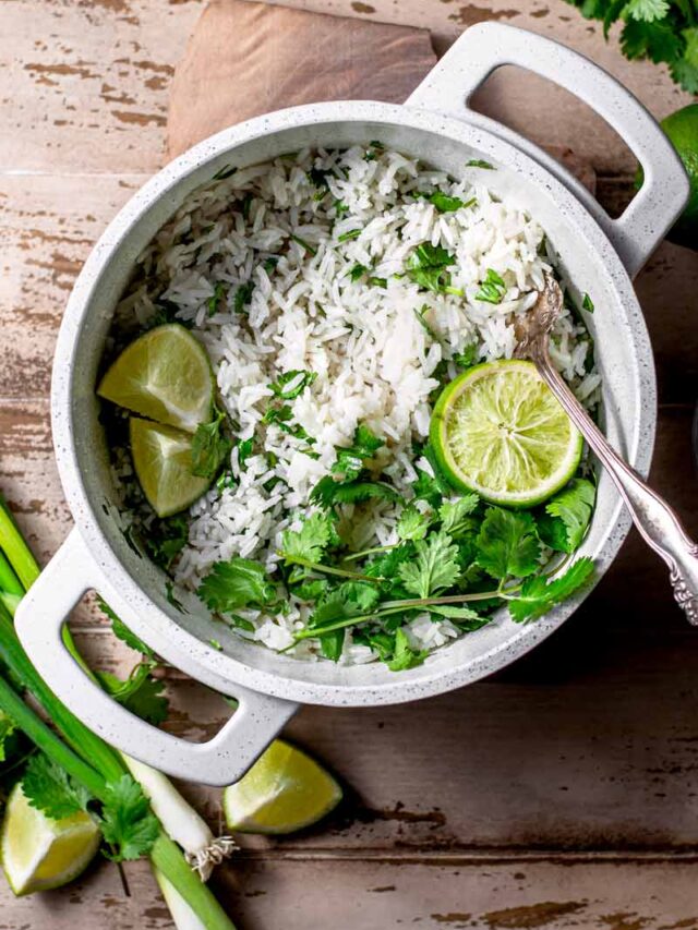 cilantro coconut lime rice in a small white pot.