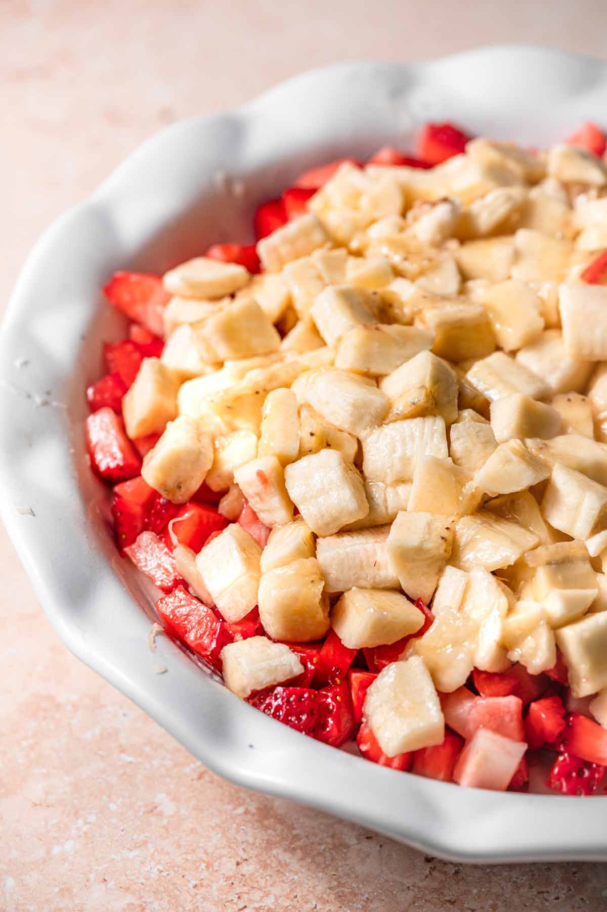 diced fresh bananas on the strawberry or crushed pineapple layer.