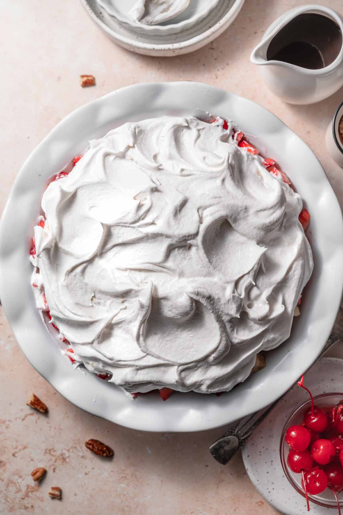 cool whip on top of the bananas.