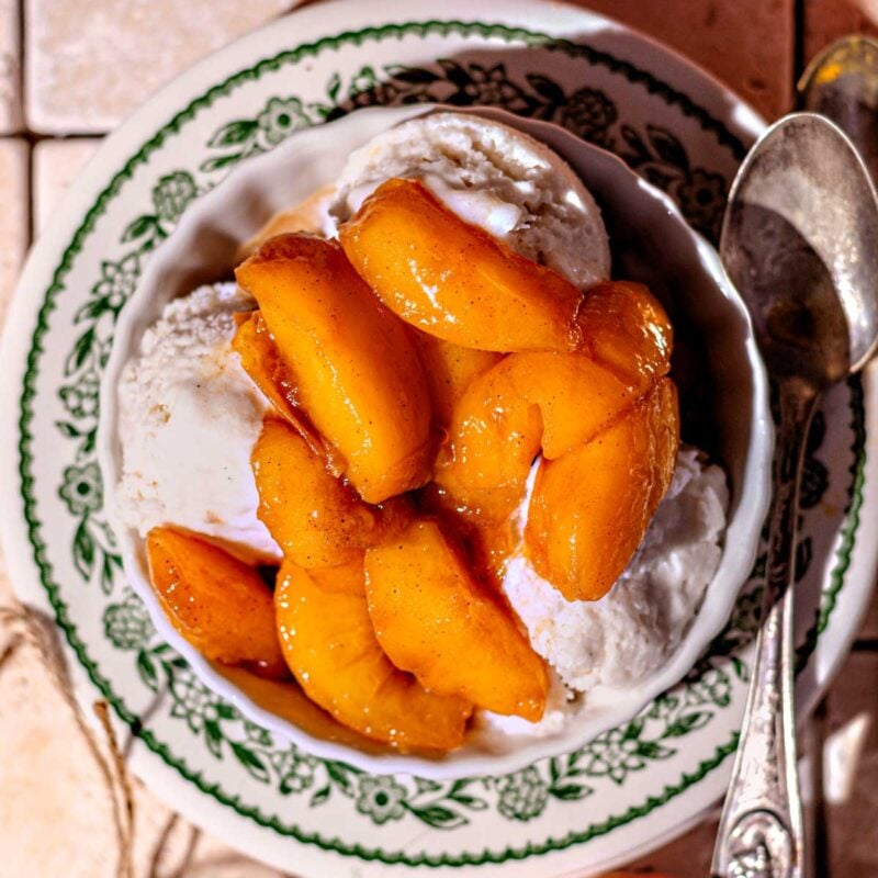 stovetop stewed peaches over coconut ice cream.