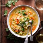 simple Italian pastina soup in a white bowl.