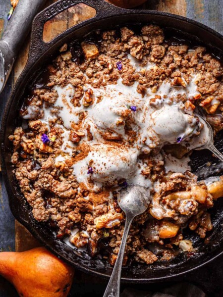 pear crumble with ice cream on top.