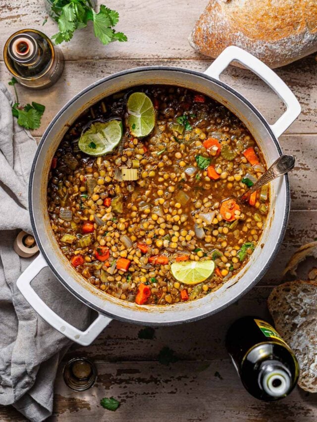 hearty vegan lentil stew in a large dutch oven.