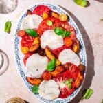 homemade vegan mozzarella with tomatoes.