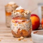 peach crisp overnight oats in a jar.