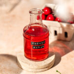 a jar of cherry simple syrup for cocktails and coffee.