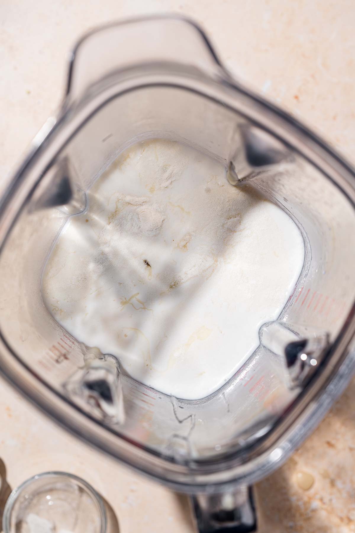 ingredients for vegan no churn vanilla ice cream in a blender.