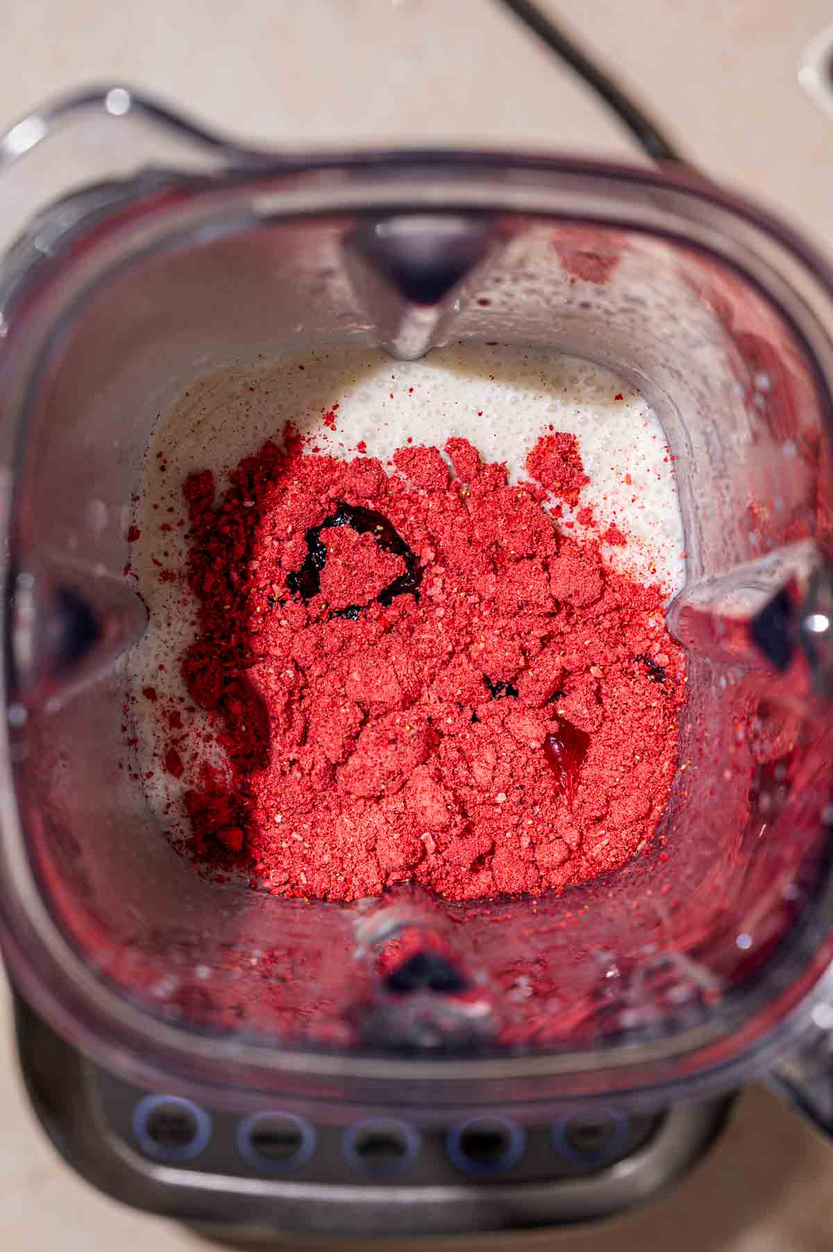 freeze dried strawberries and jam in a blender with ice cream base.