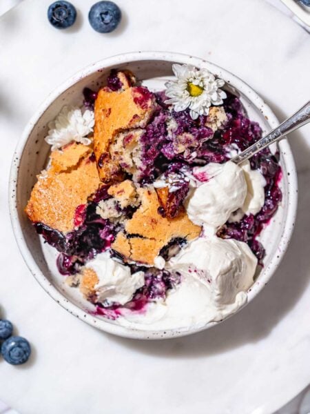 the best vegan blueberry cobbler with dairy-free whipped cream.
