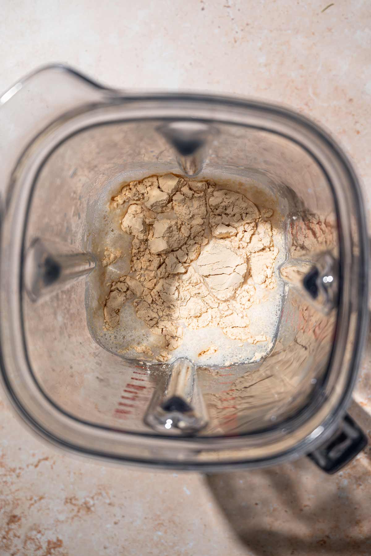 soy milk and pea protein in a blender.
