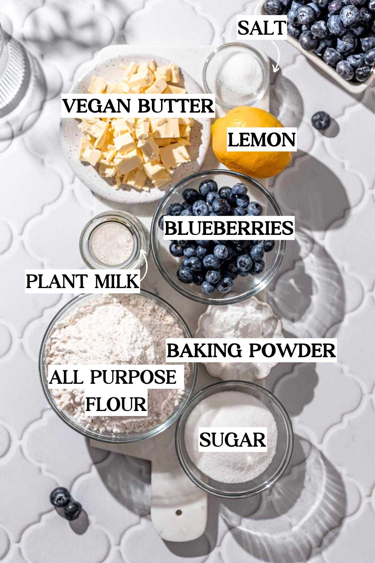 ingredients like blueberries, lemon, sugar and flour.