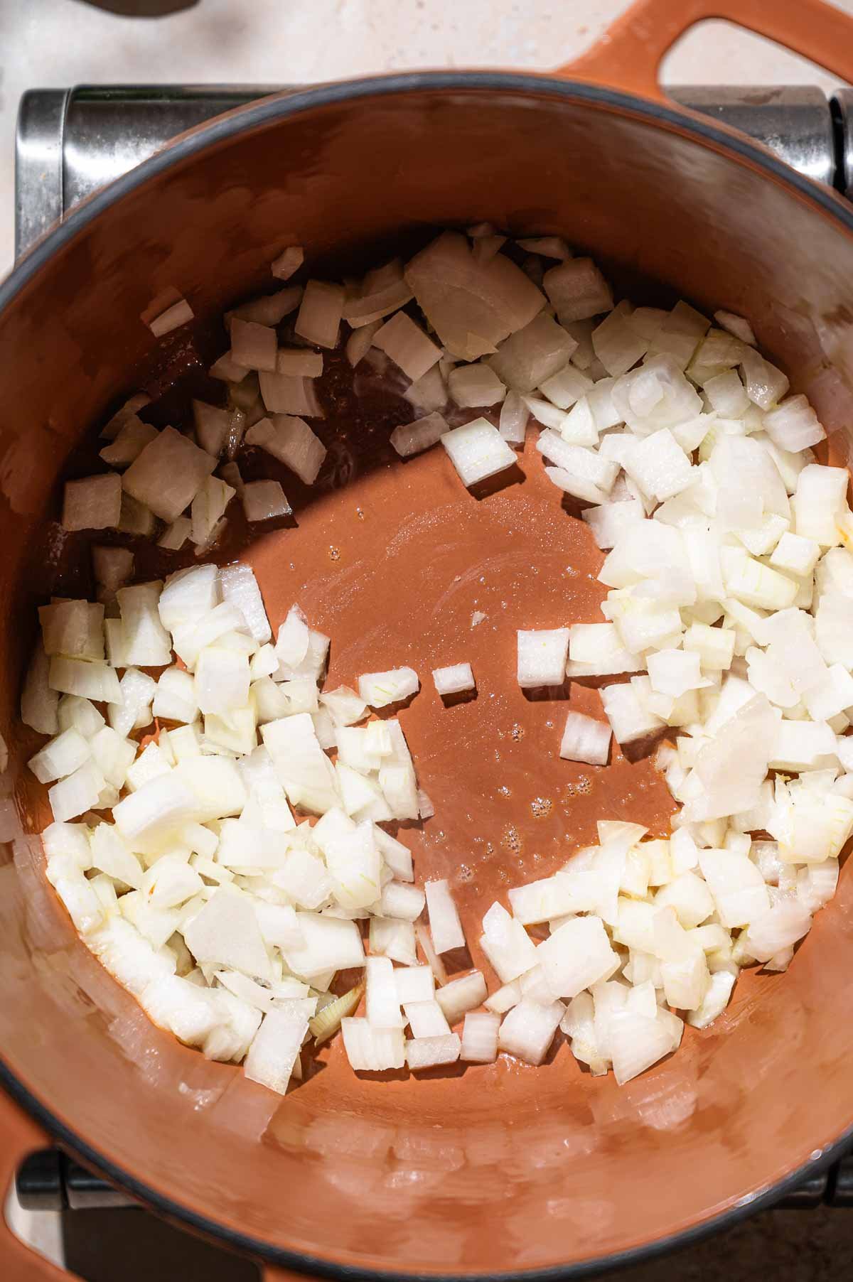 diced onion in a dutch oven.