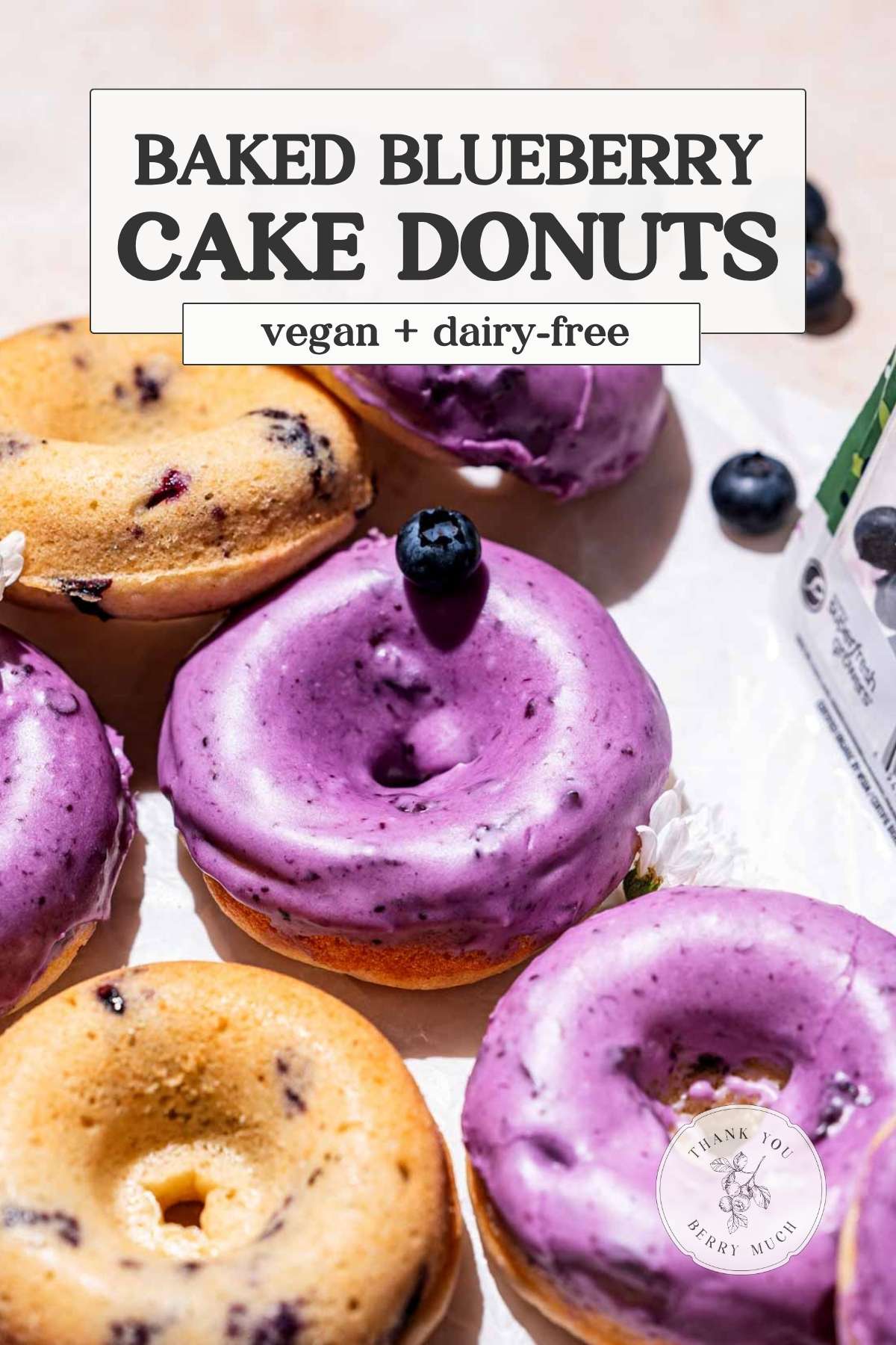 a pinterest pin for the best baked blueberry donuts that are vegan.