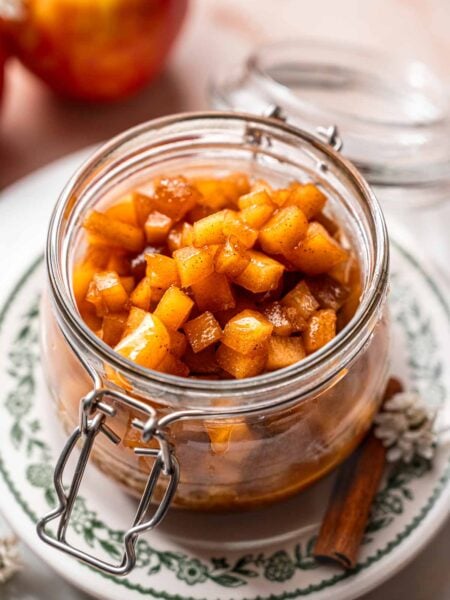 easy stovetop caramelized apples in a glass jar.