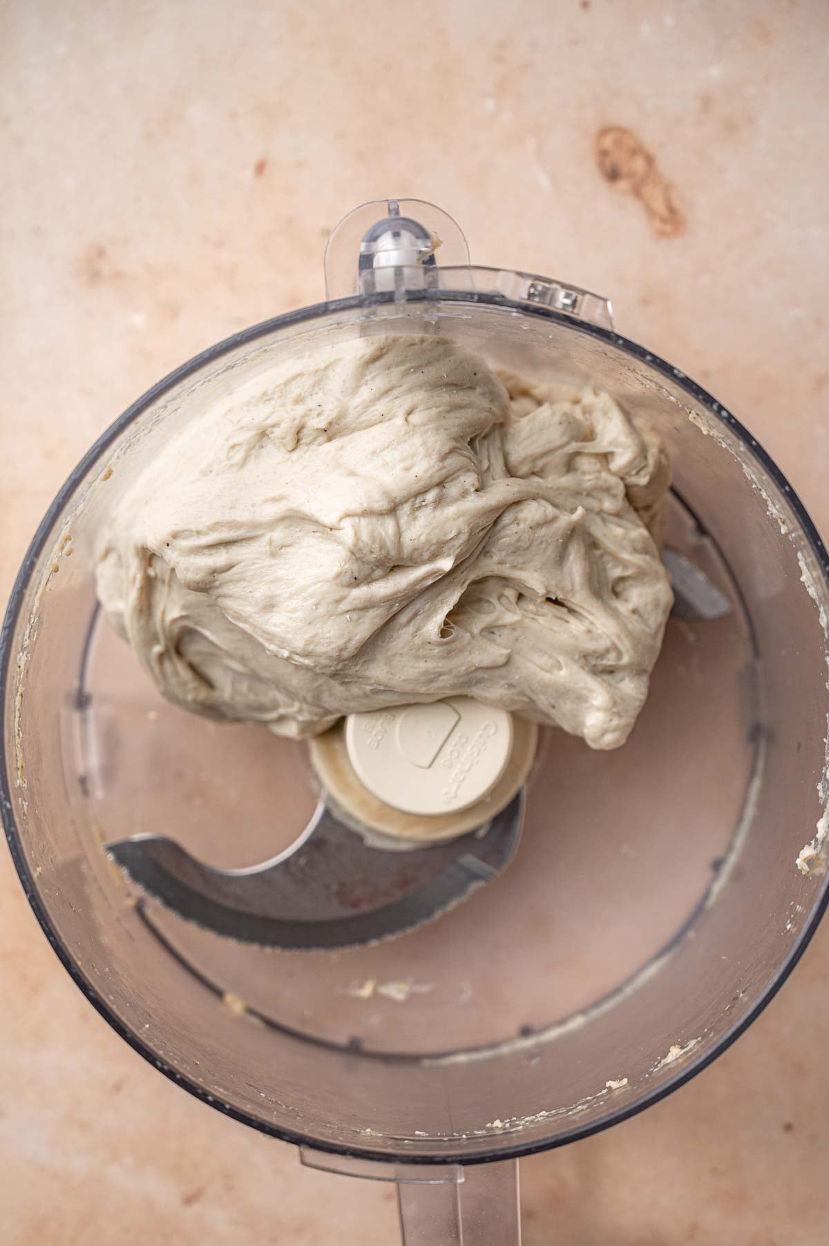 the seitan dough after kneading in the food processor.